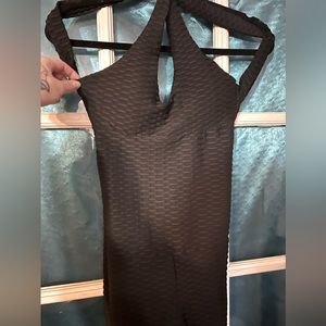Black full body workout romper.